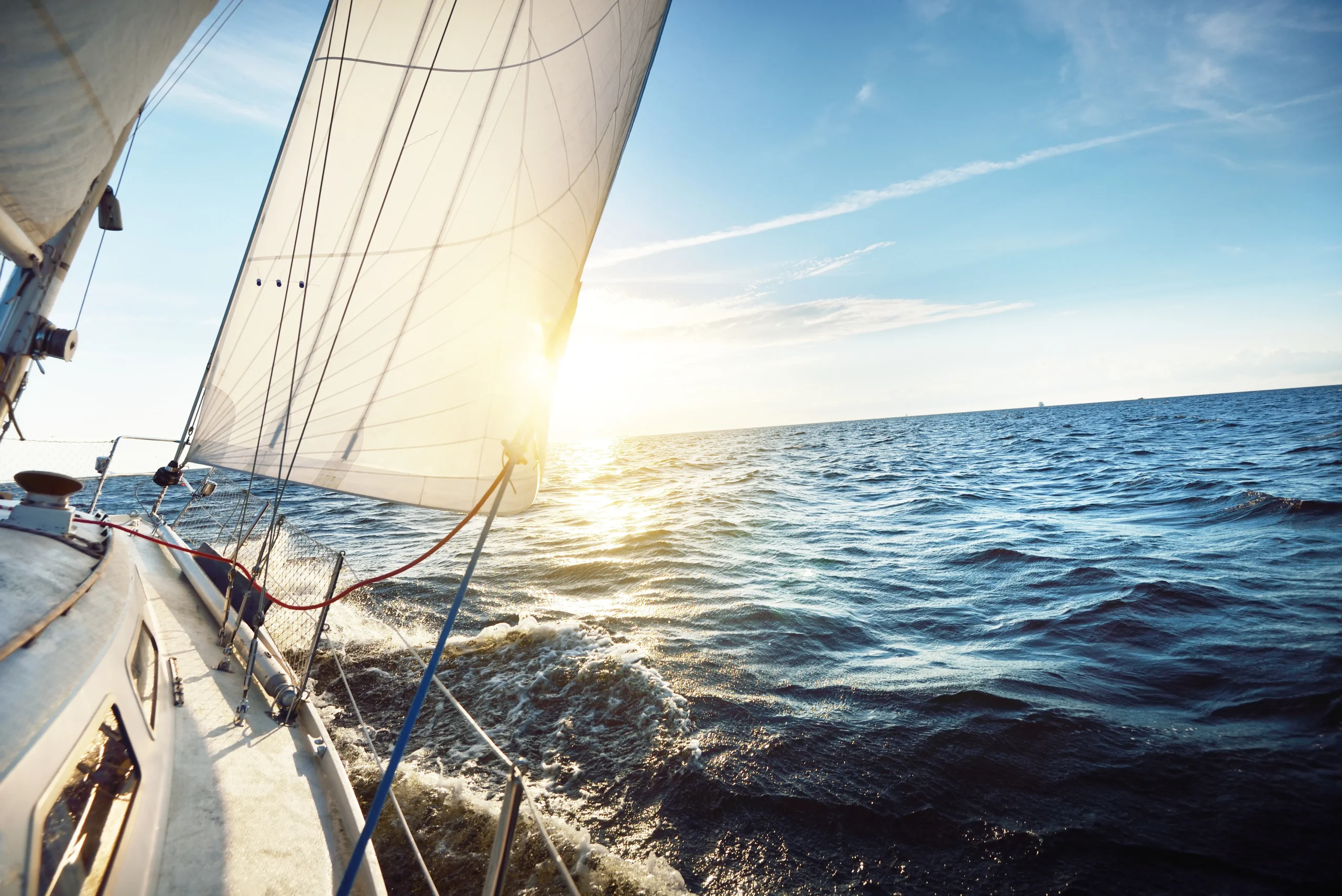 Sailing Comfortably Numb sailing vessel in the Caribbean at sunset